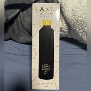 Black Arcana Arc Bottle with gold lid
